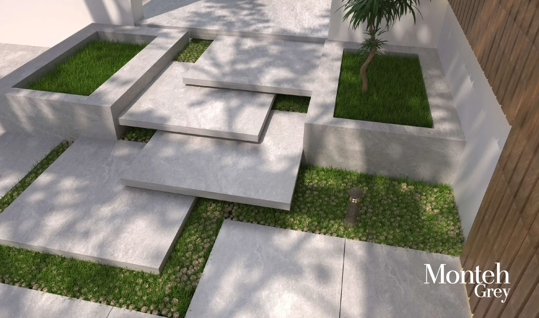 Outdoor terrace with large-format porcelain paving overlooking a landscaped garden